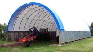 blue and white hoop building on a ponywall