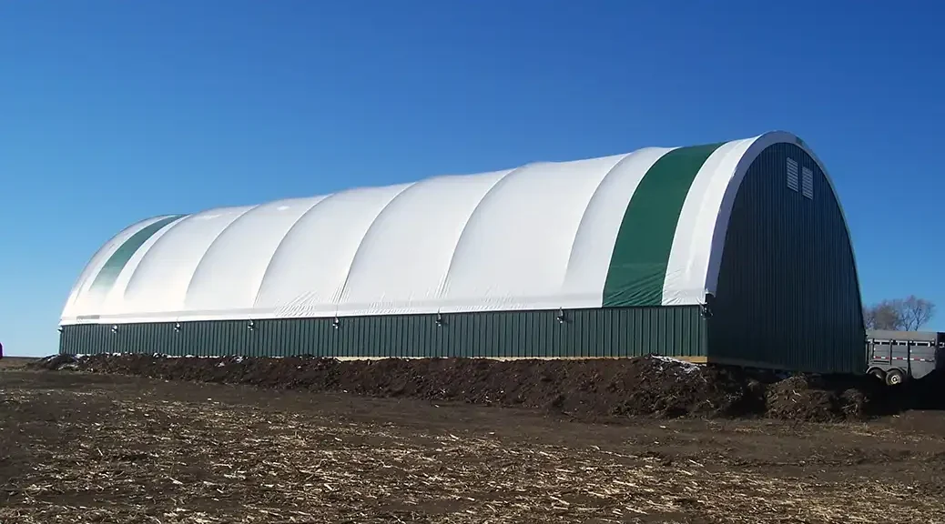 Green and white hoop barn