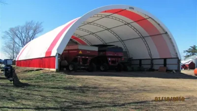 Hoop building for farm equipment storage