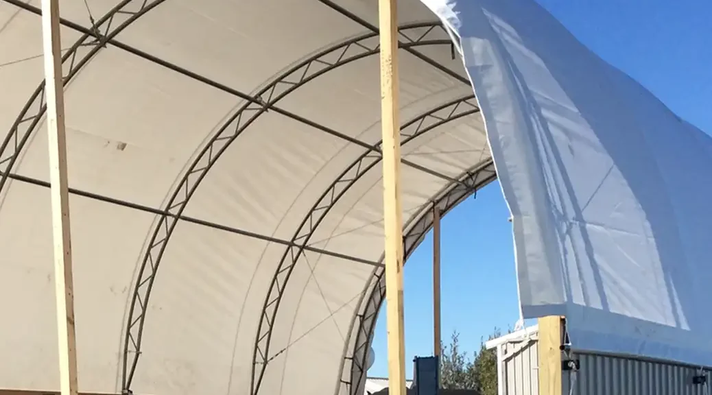 Installing a new hoop building cover