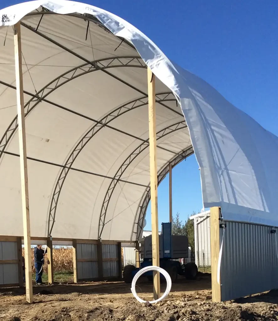 Installing a new hoop building cover