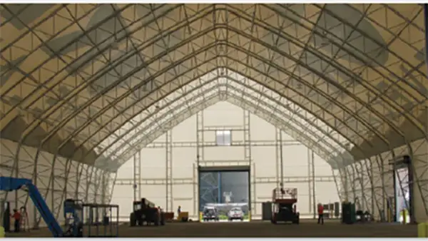 Clear span interior of a truss hoop building