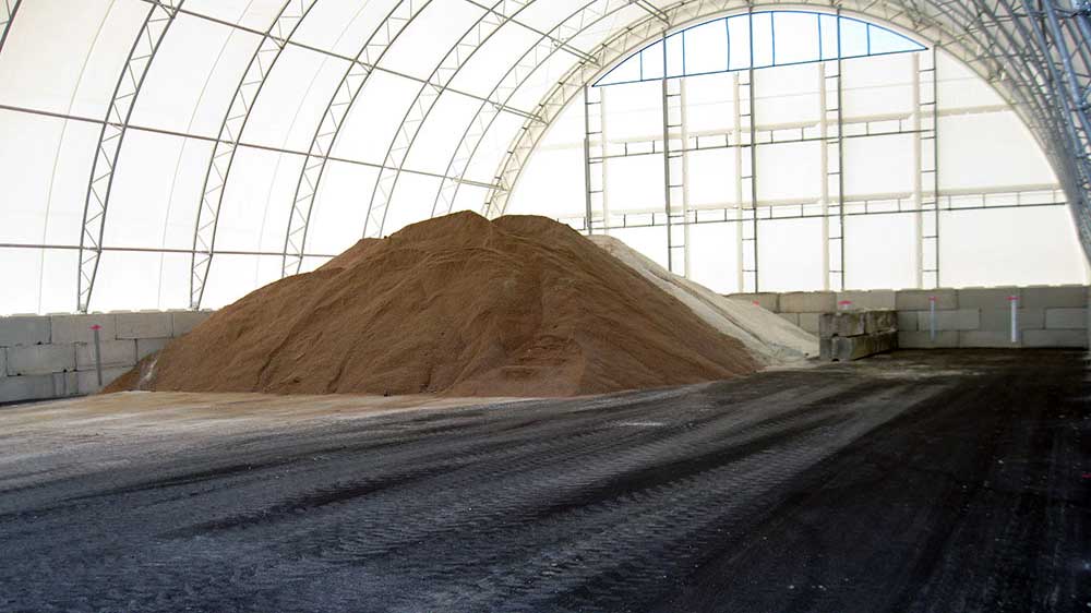 Road sand in a high profile hoop shed