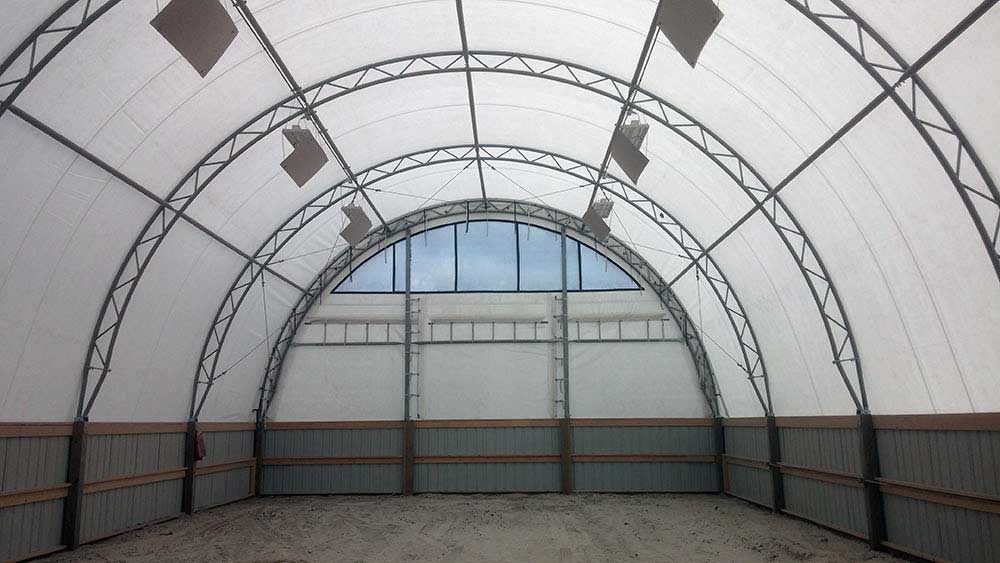 Small double truss fabric tension building